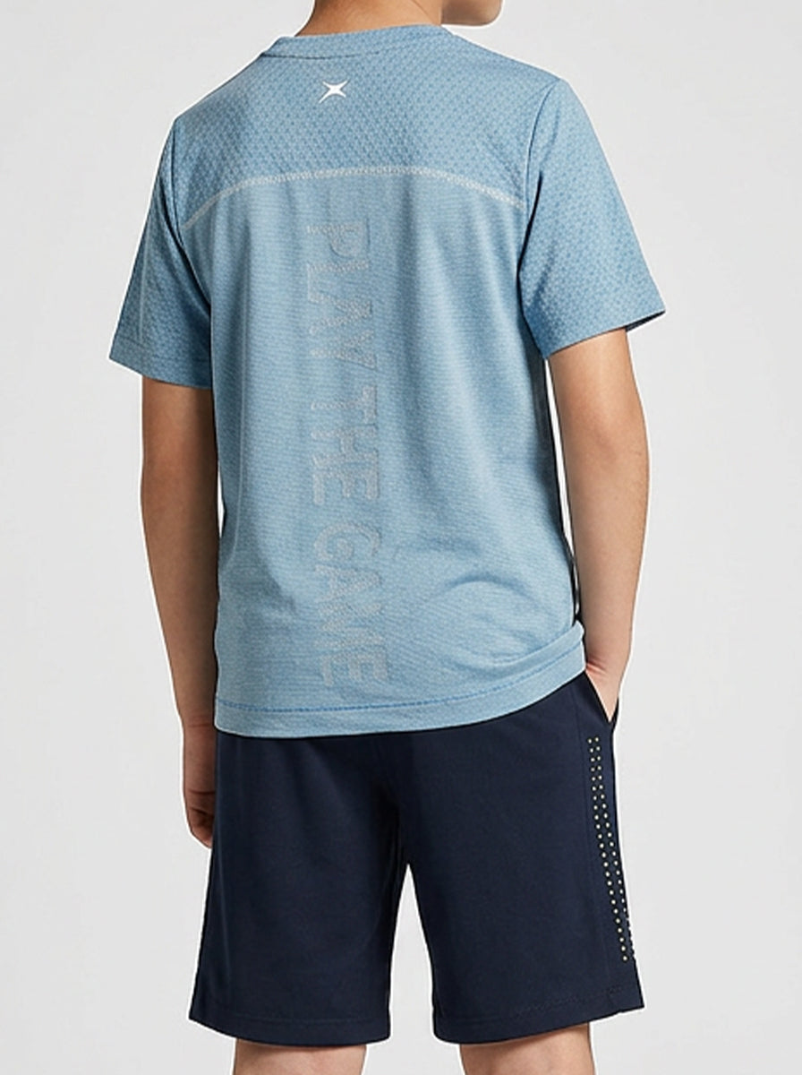 A boy  wearing a blue sports t-shirt and navy shorts on a white background