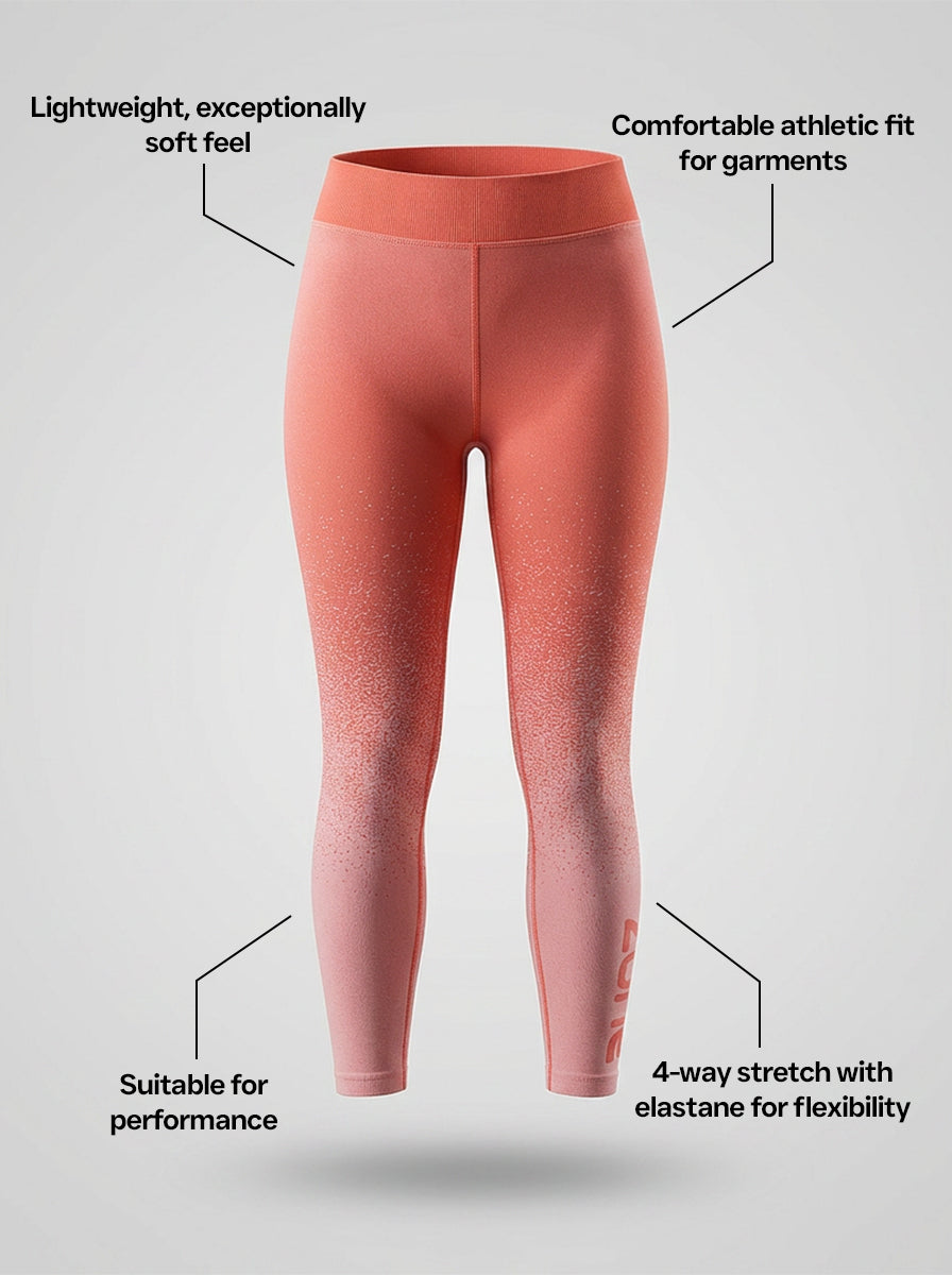 Orange leggings with text highlighting features on a light gray background