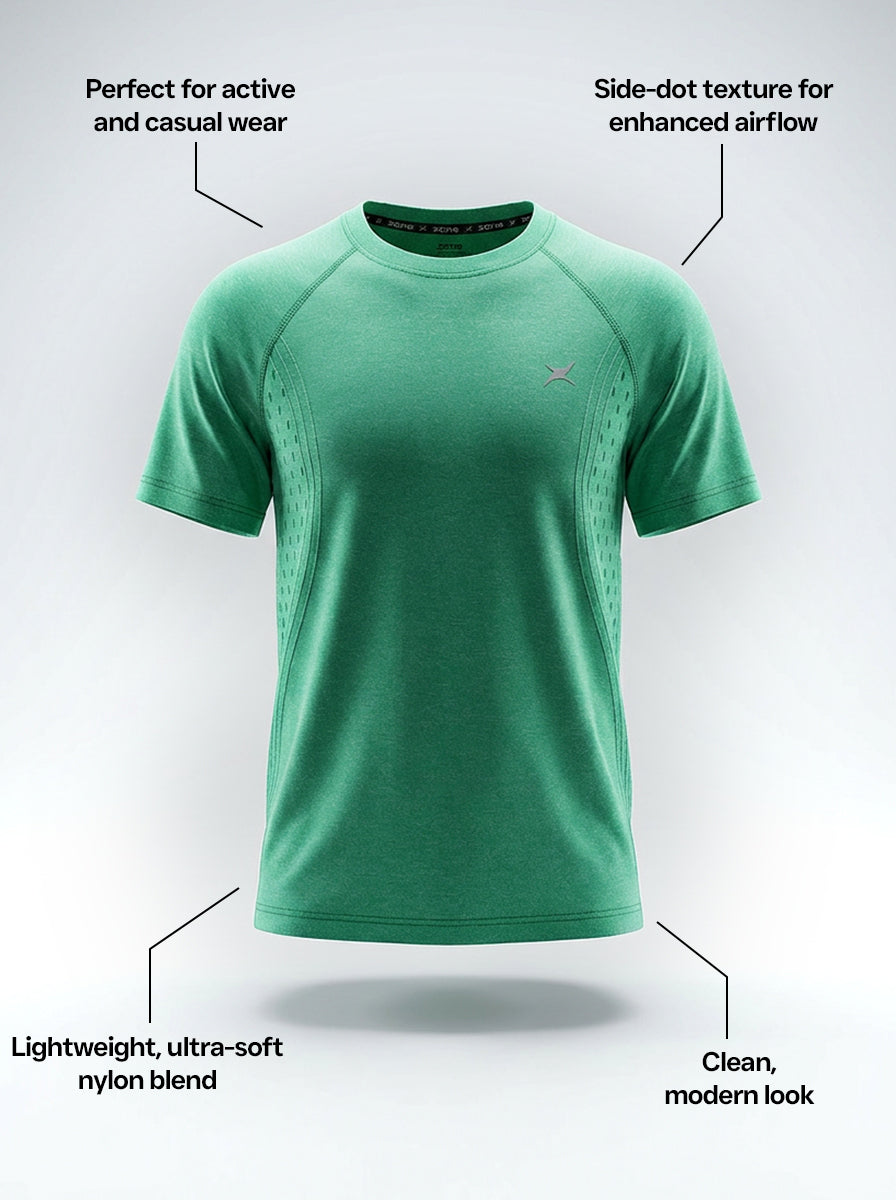 Green t-shirt with text highlighting features on a white background